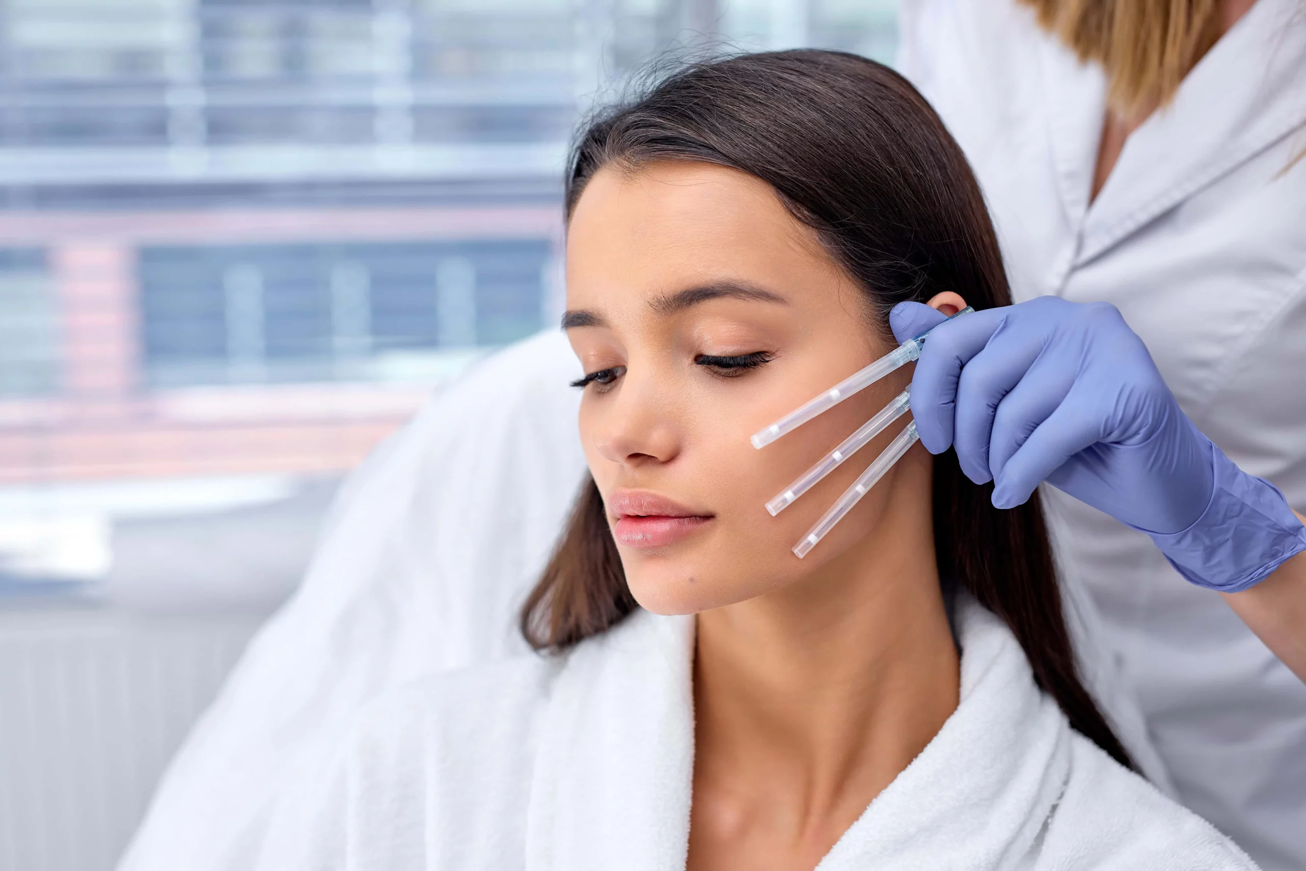 Woman receiving injectable treatment at Remedy Tupelo in Tupelo, MS for facial rejuvenation